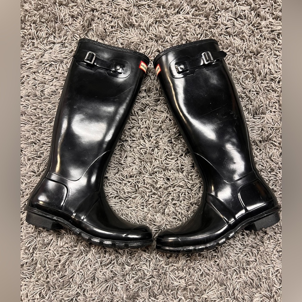 Tall black hunter rain boots
